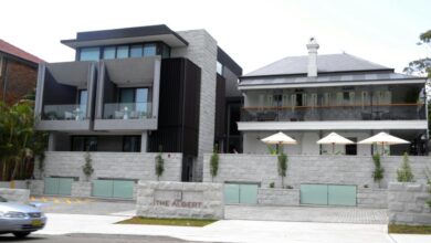 a building with a stone wall