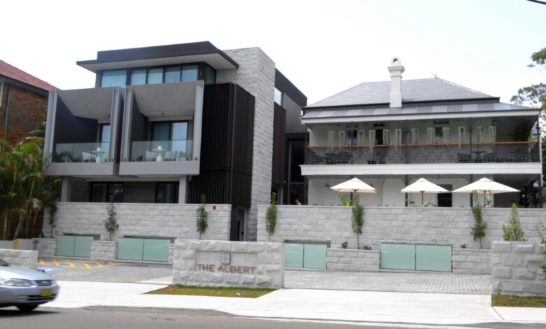 a building with a stone wall