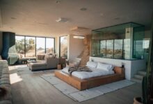 white mattress beside sectional sofa