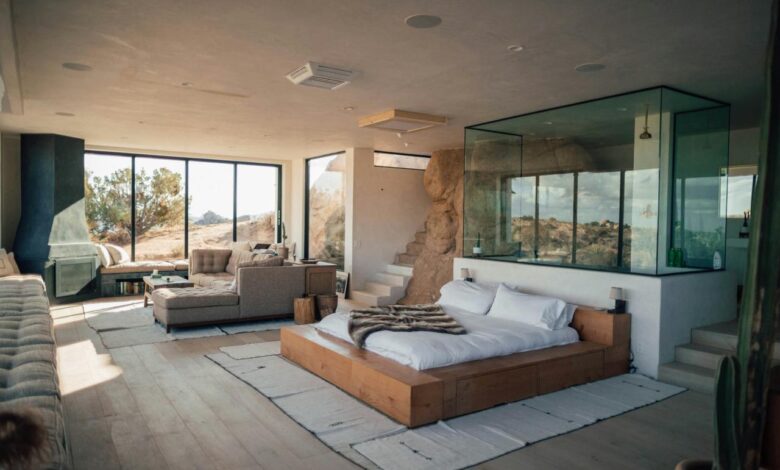 white mattress beside sectional sofa